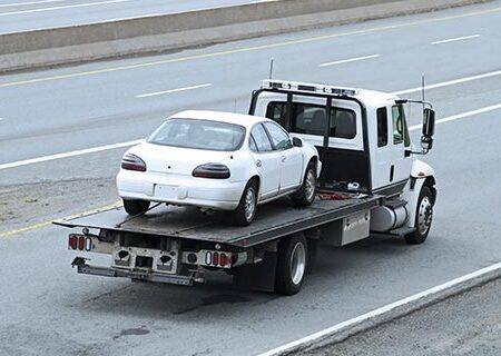 Car on Tow Truck after accident with Car Insurance in Cornelius, NC