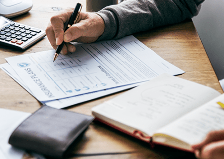 Business insurance signing documents in Harrisburg, NC 