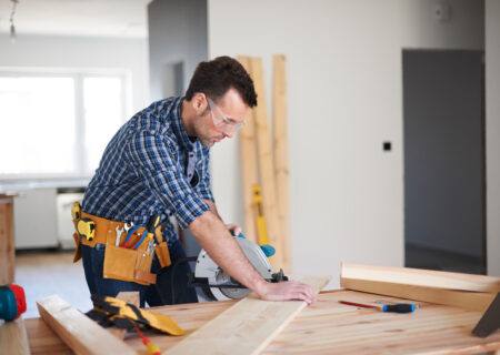 worker cutting work with Contractors Insurance in Harrisburg