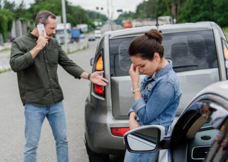 Drivers Upset and on Phone After an Accident Calling Their Car Insurance Company in Concord, NC