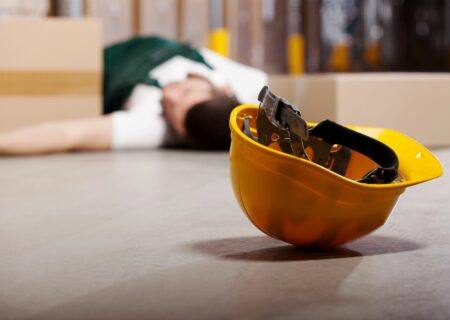 Hard Hat and Workers on Ground Needing Workers Compensation Insurance in Harrisburg, North Carolina