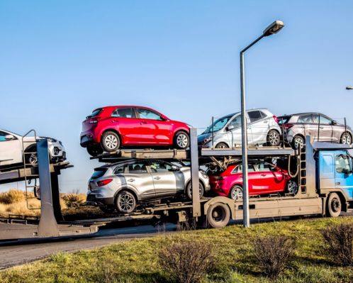 Car Carrier with Insurance Transporting Cars to Site in Huntersville, NC